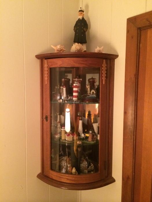 Wall hanging curio with lighthouse Collectibles. All will be sold seperately