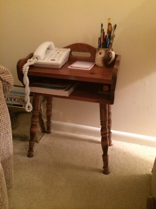 Very charming little phone table.