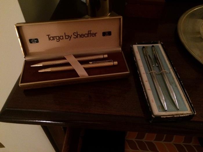 Two vintage pen and pencil sets.