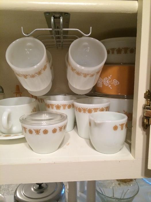 Are you ready for this? Three photos showing a set of Corelle wear which includes cups, creamer, sugar, serving bowls....