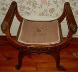 306 - Saddle chair with lions head arms