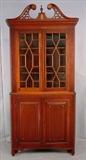 512 - 2 piece early enlayed mahogany corner cabinet with pegged construction. 80in tall, 35in wide, 20in