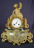 77- Gold ornate french clock with boy on top and black marble base, has some damage, 15IN T, 12IN W