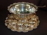 76- Silver plate punch bowl set, includes 12 cups, bowl , tray, and ladel, bowl 8IN T, 15IN D, tray 19IN D