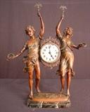 122 - Art Nouveau figural clock of man and woman on black marble base, 20IN T, 17IN W, 7IN D