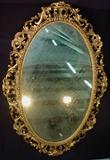 139 - Rococo pierced oval mirror with original gold frame, 43IN T, 29IN W