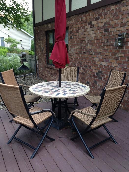 ceramic patio table with six chair and umbrella
