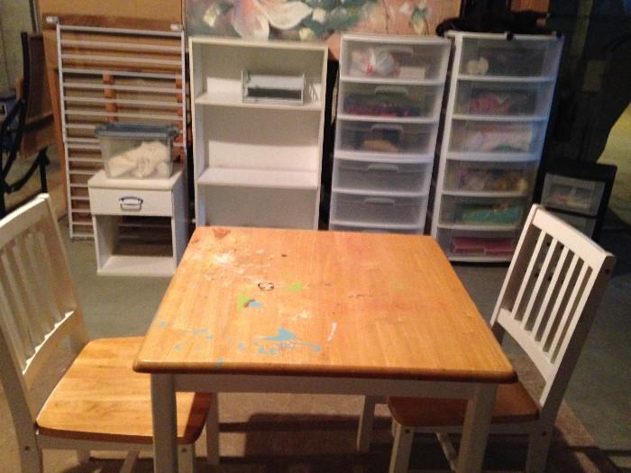 Kids table and chairs.  Book case, end table and plastic storage drawers.