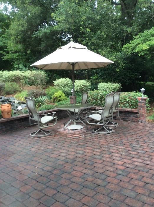 patio set for 4 with swivel rock chairs and umbrella