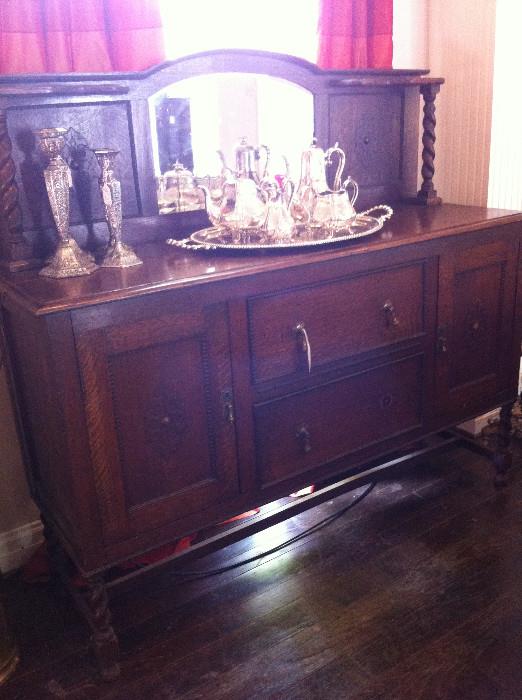 Antique barley twist buffet/sideboard with mirror; silver plate tea service