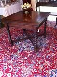 Barley twist draw leaf table (closed); antique Persian Kashan 9.9 x 12.3 Rug