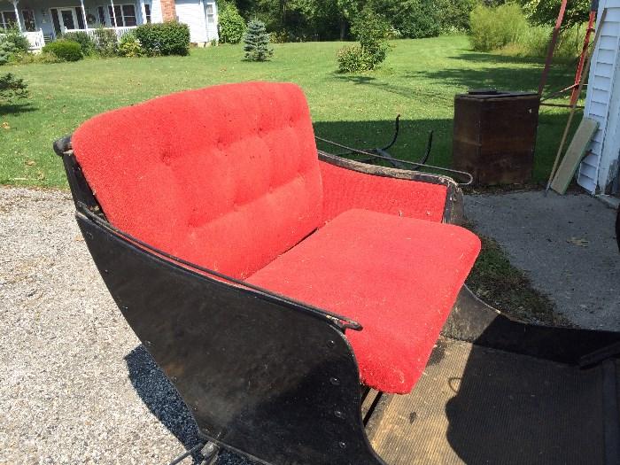 Red upholstery looks old timey and also looks great if you want to use for Christmas Decor