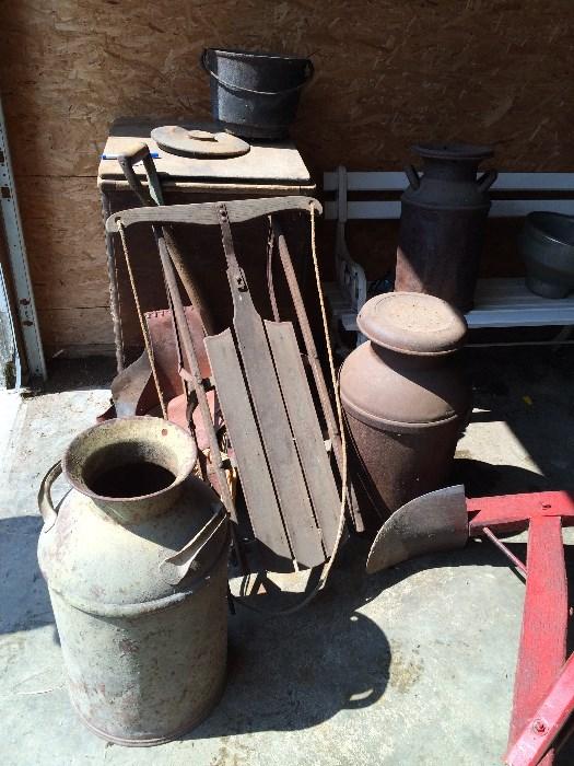 3 milk cans, some sleds, galvanized and enamel tubs, buckets, chicken feeders...