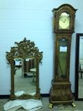 grandfather clocks and ornate mirrors