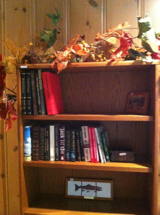             Several book shelves; variety of books