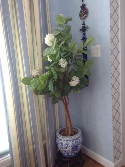 Faux tree planter, one of several