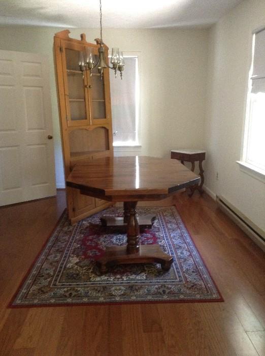 Kitchen/dining room table with chairs and corner cupboard