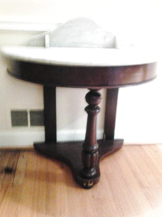stunning Mahogany end table with white marble top.