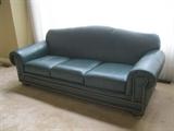 Green leather sofa - $150
