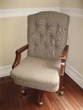 Upholstered chair on coaster - $60
