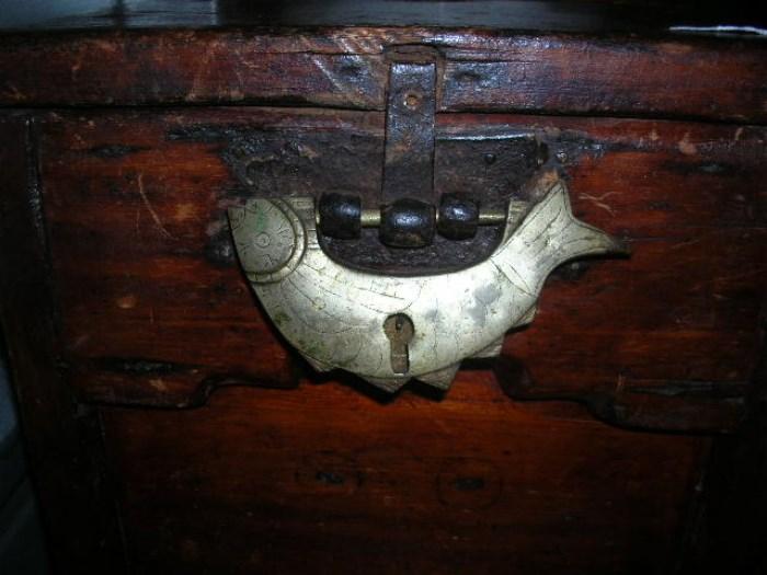 Great brass fish lock on old trunk