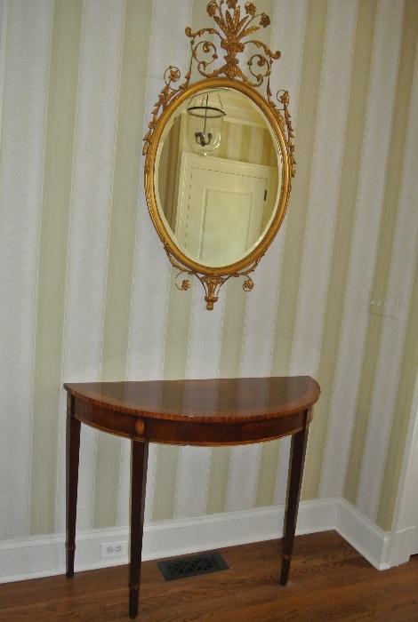 Pair of Demi Lune Tables and Oval Giltwood Mirrors