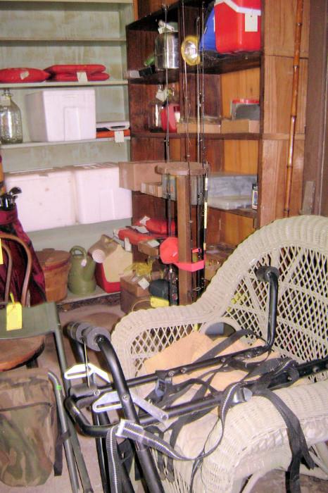 fishing tackle and rods, wicker chair