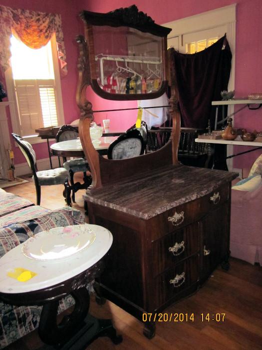 Marble top washstand with mirror and one of a pair of reproduction marble top end tables