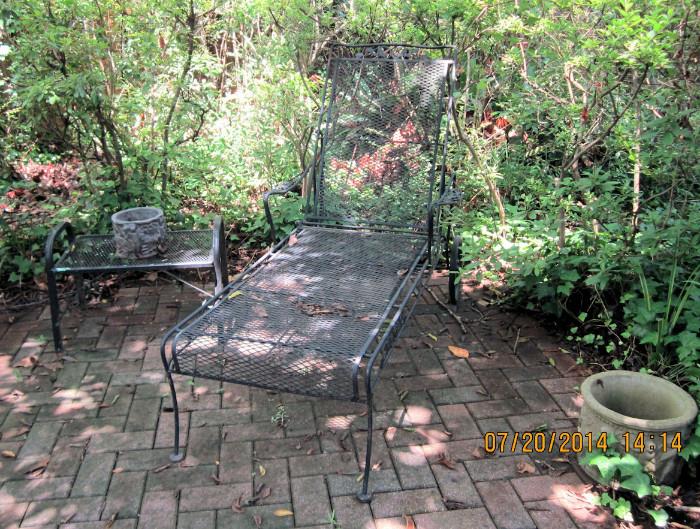 patio chaise lounge and table, pots