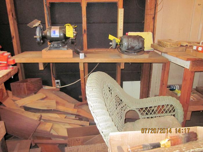 wooden work benches, tools, wicker chair, etc.