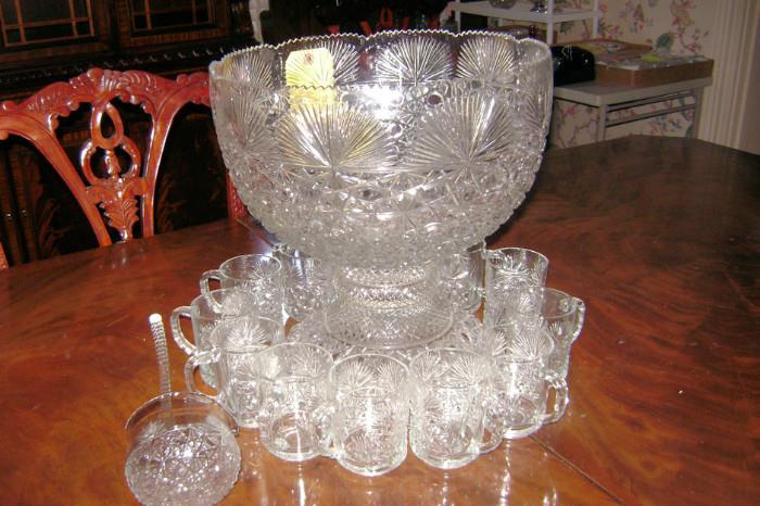 cut glass punch bowl, cups & ladle on dining room table