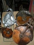Antique wooden and cast iron pullies