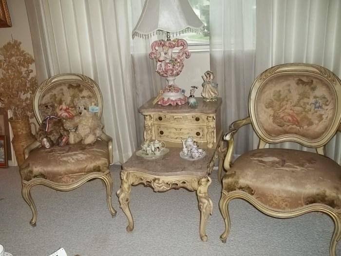 victorian chair and ornate end table with drawers