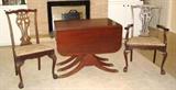DUNCAN PHYFE DINING TABLE WITH INSERT SHOWN WITH TWO CHIPPENDALE CHAIRS