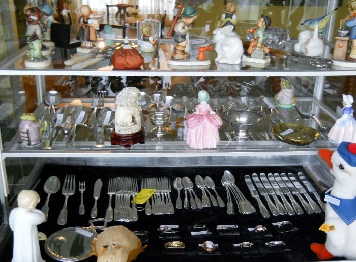 Humme'ls, Royal Doulton figurines Jewelry, Sterling flatware & Serving Pcs., etc.
