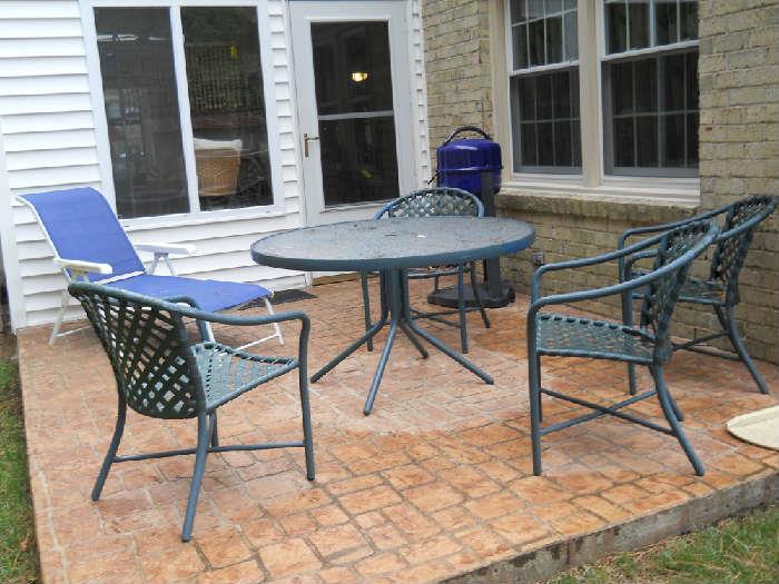 patio table and chairs, electric grill, lounge chair