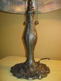 metal base on Thomas Kinkade lamp