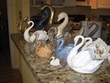 more swans!...in ceramic, glass, and brass