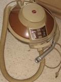 vintage Hoover celebrity pancake vacuum.