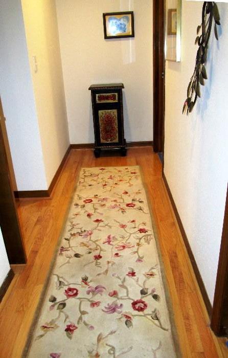 Rug Runner with floral pattern accents; Also shown is an arts And Crafts Stand with cabinet and drawer storage.  Artworks shown are also available. 
