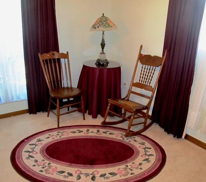 Vintage Oak Spindle Back Rocking Chair; Oak Spindle Back Side Chair;  Floral accented area rug, and the accent table lamp shown are also available.