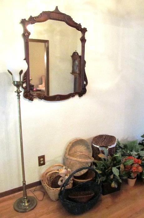 Vintage Mirror with Well Carved mahogany frame...walnut finish; Also shown are a collection of basketry and artificial florals, and an accent Floor Lamp