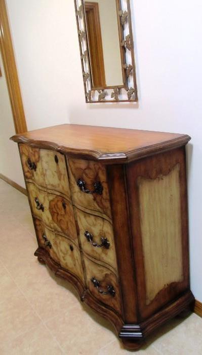 Attractive Thomasville Sideboard / Chest of Drawers with faux and stencil accents, drawers storage with brass pulls, ...rich finish;  Also shown is an ornate metal framed mirror with floral accented borders