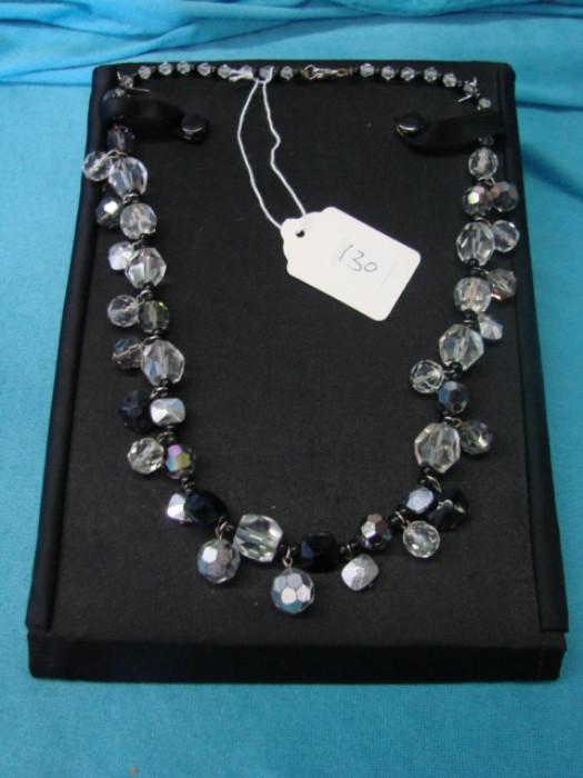 Very elegant Austrian crystal necklace with Swarovski elements; Very interesting black and clear "Zebra" pattern. Necklace measures 18" long. In excellent condition, please see pictures for accurate grading.