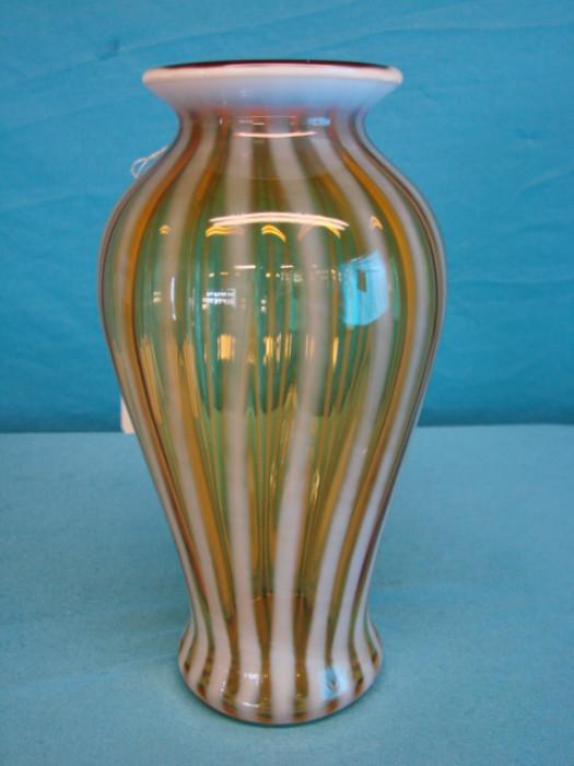 Beautiful vintage opalescent art glass vase; Gold and white striped coloration. No wear, in excellent condition. Stands 10" tall.