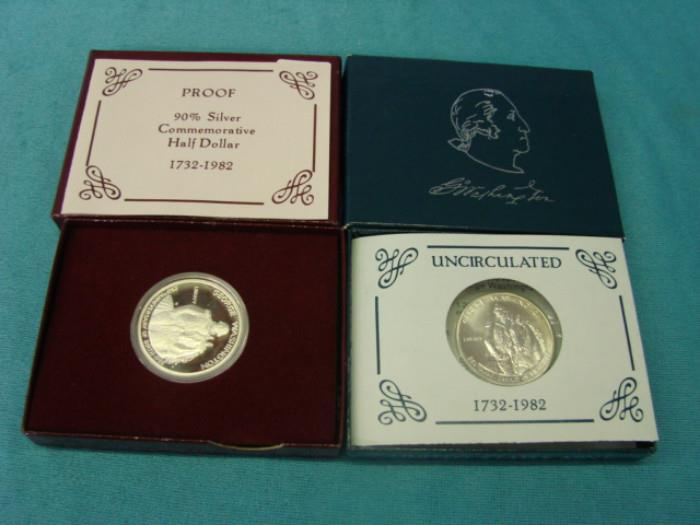 One uncirculated George Washington silver commemorative uncirculated half dollar, and one George Washington commemorative proof half dollar; Both are in original boxes with COAs.