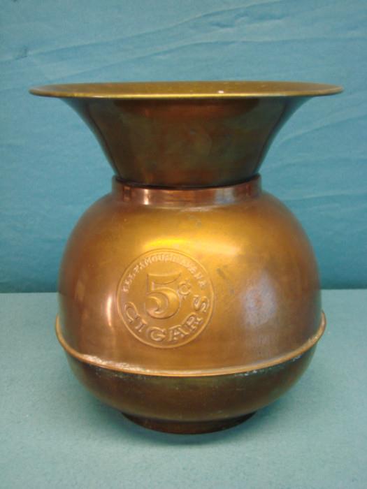 Very nice antique brass and copper spittoon; Marked "All Famous Havana 5 cent cigars". Has some light dents, scratches, and oxidation spots. Measures 10 1/2" tall.