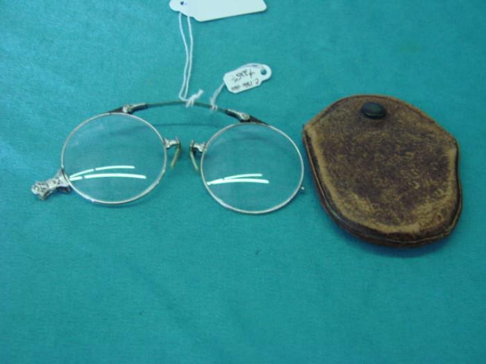 Very rare Chatelaine "Lorgnettes" Victorian-era spectacles; Come with original leather carrying case, which the glasses fold down to fit inside of. Opened up, glasses measure 3 3/4" across. In excellent condition for age, please see pictures for more detail on the condition of this lot.