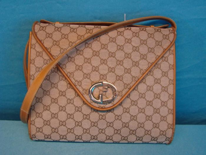 Beautiful authentic, vintage Gucci shoulder bag, made in Italy; Inside of bag is signed. Has some light wear, some light marks on leather, the rest of the bag is in excellent condition. Measures 10 1/2" x 9" x 2".