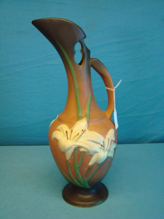 Beautiful Roseville USA pottery pitcher, no.24-15"; In excellent condition, no chips or cracks. Stands 15 1/2" tall.